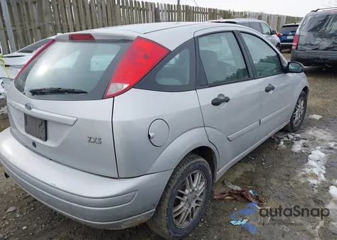 2004 Ford Focus Zx5 из США, поврежденный, VIN 3FAFP37394R115084